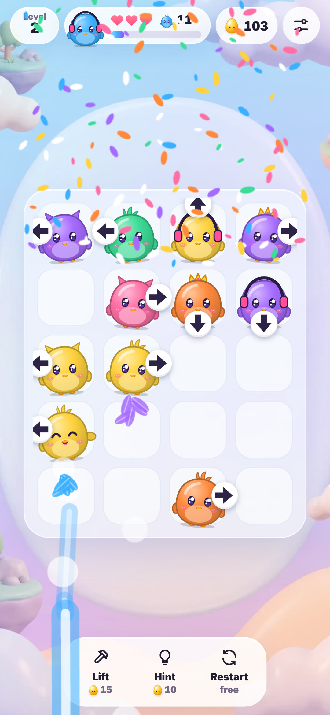 Flock Out level 2 on a full board of purple, green, yellow, pink and orange OvOs facing different directions under falling confetti